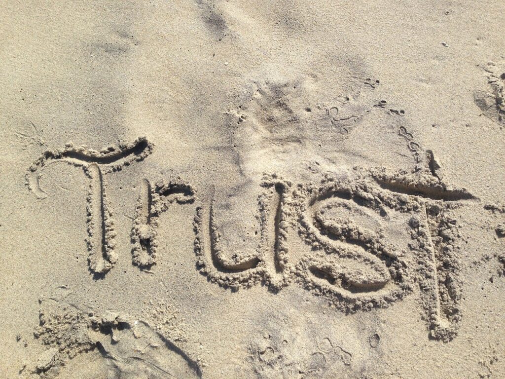 trust, written in sand